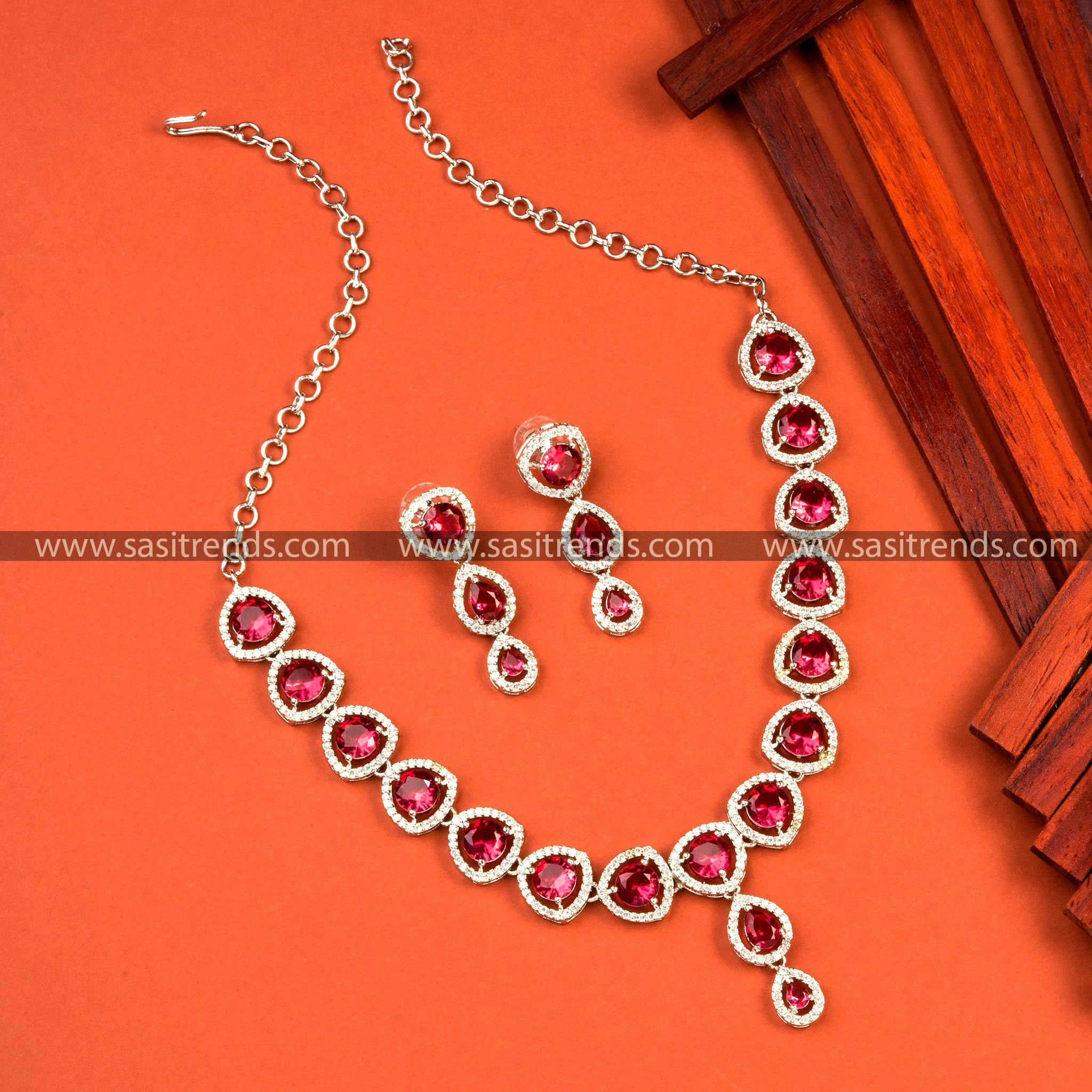 Luxurious Rhodium Silver Necklace Set with Red American Diamond Stones - Party Wear Collection