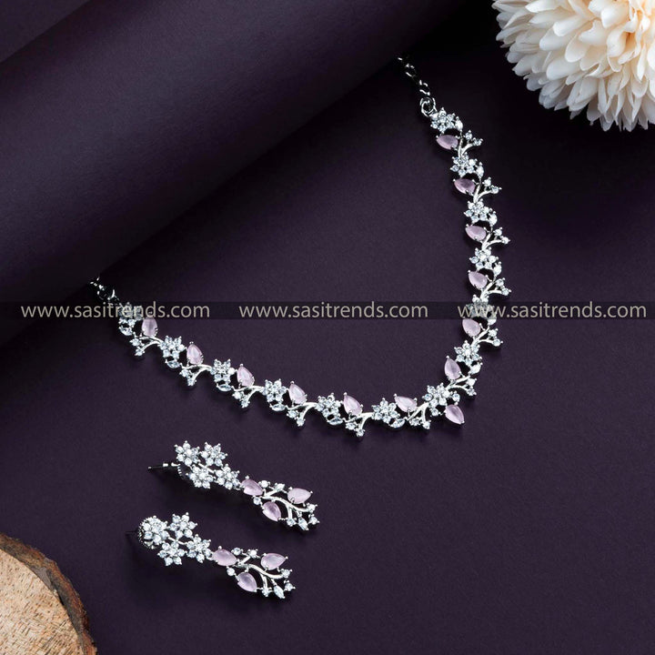 Charming Rhodium Silver Plated Necklace Set in Pink. Elegant Floral Pattern, Accentuated with American Diamonds.