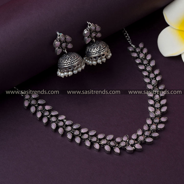 Trendy Party Wear Oxidized German Silver Necklace with Pink Stones and Pearl Jhumkas