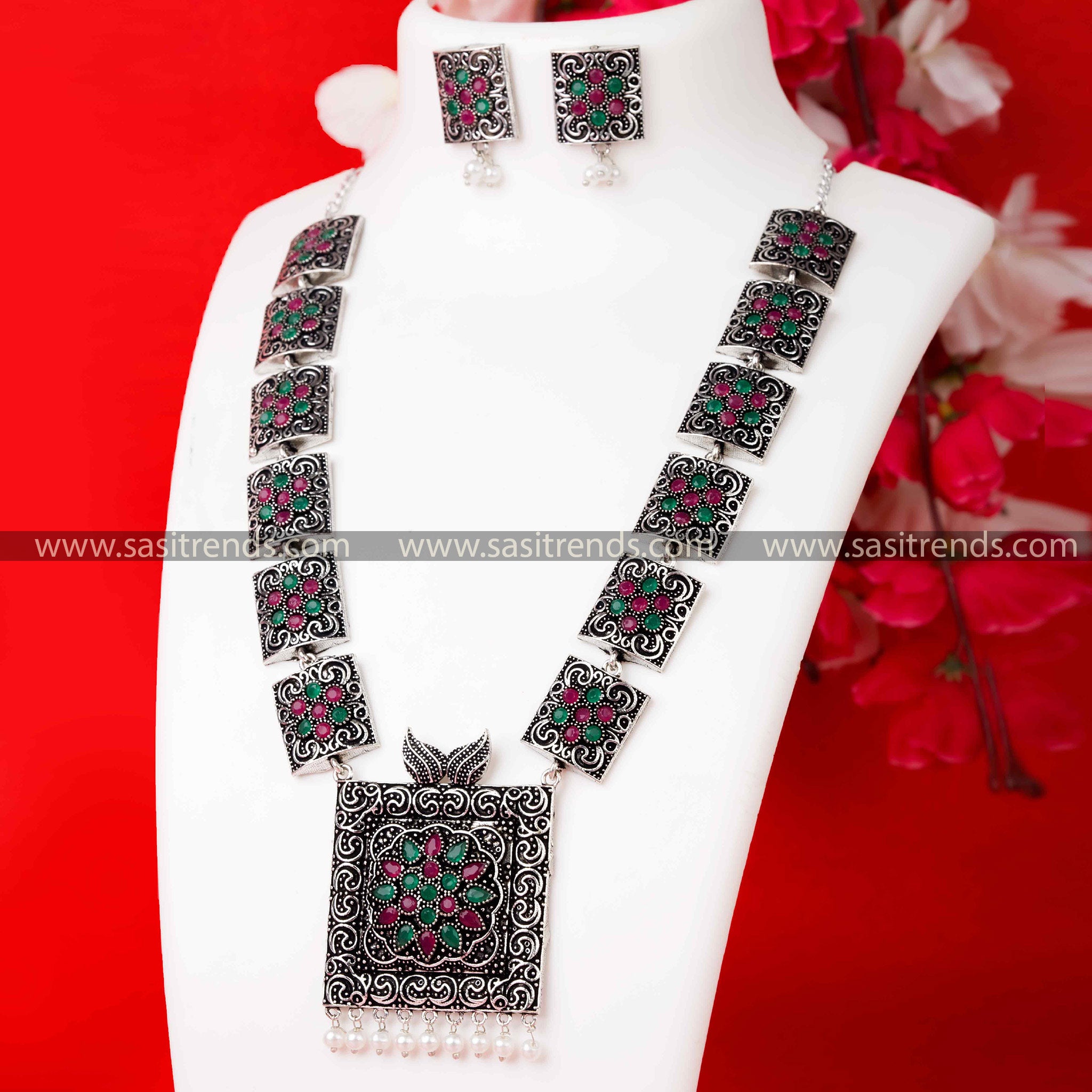 Stunning Trendy Party Wear Oxidised German Silver Pearl Necklace with Ruby-Green Stone Pendant and  Pearl Earrings.