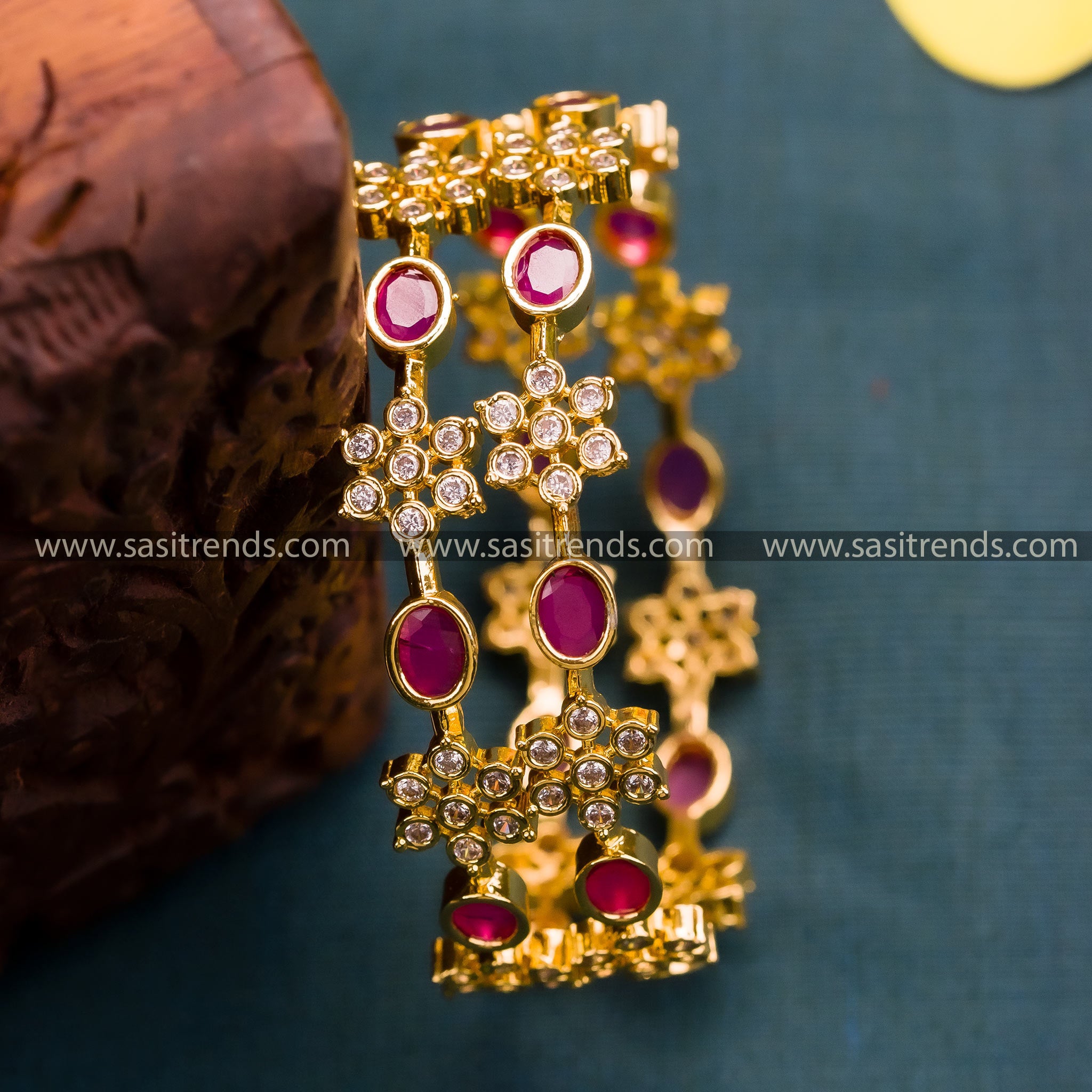 Trendy White Ruby Micro Gold Plated Bangles with Leaf Pattern and White AD Stones