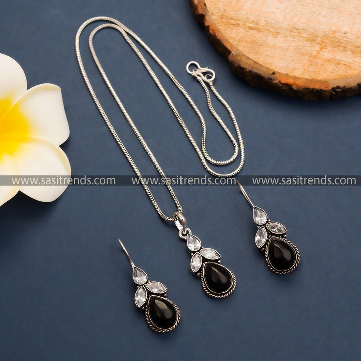 CHIC CHOICE: Oxidized German Silver Floral Pendant Chain Set with Black Stones - Timeless Beauty for Online Shopping