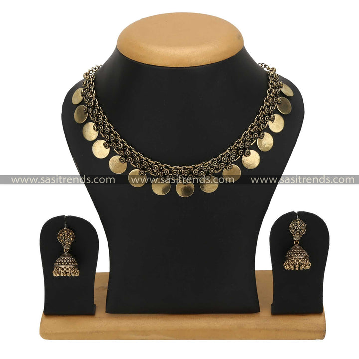 Regal Antique Gold Plain Coin and Jhumka Jewellery Set, marrying the luster of gold with the rustic beauty of oxidised accents