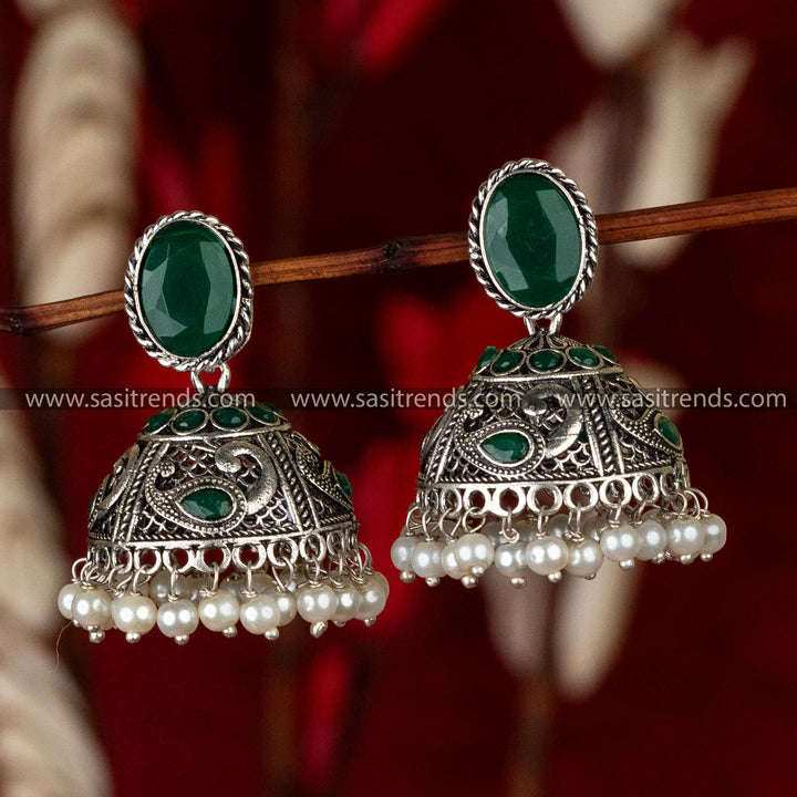 Oxidised German Silver Peacock Jhumka Earrings With Green Stone