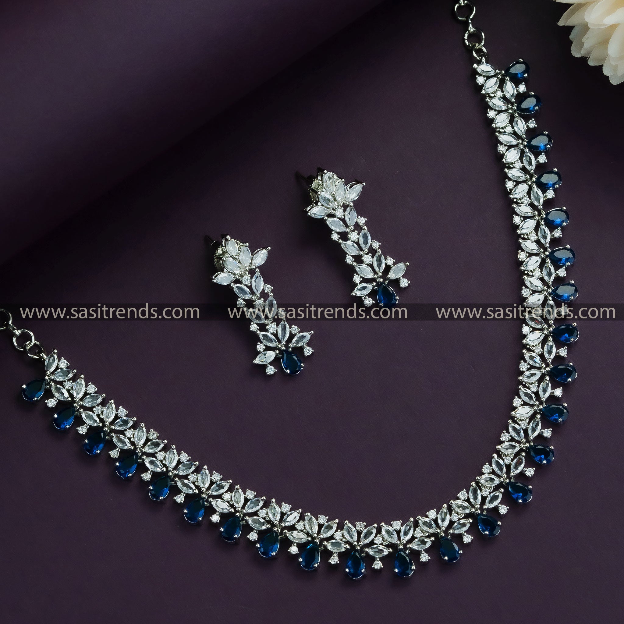 Ocean Blue Allure: Rhodium Silver Plated Floral Necklace Set with American Diamond Stones - Party Wear Collection in Ocean Blue for Women