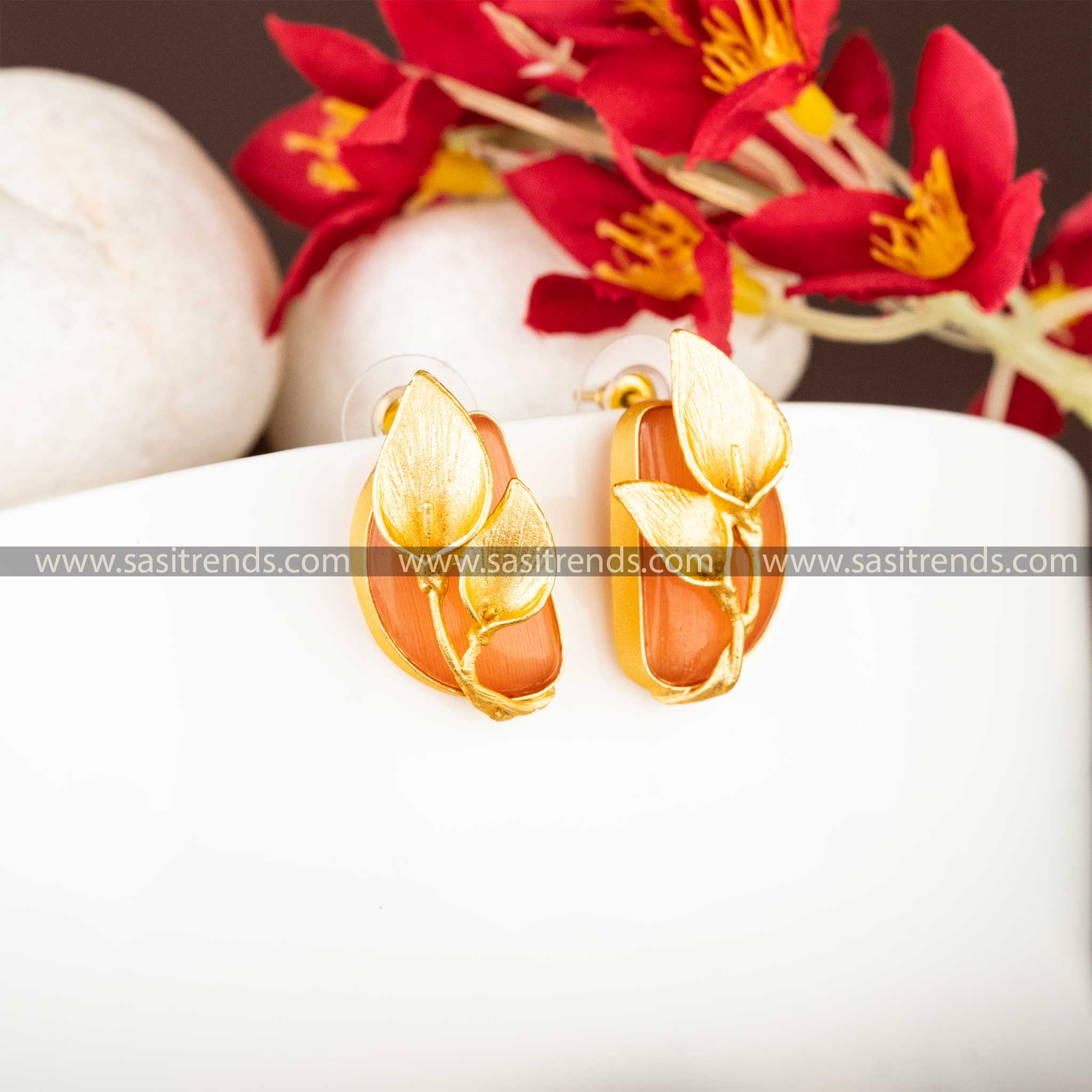 Party Wear Gold Plated Push Back Leaf Pattern Peach Stone Studded Earrings