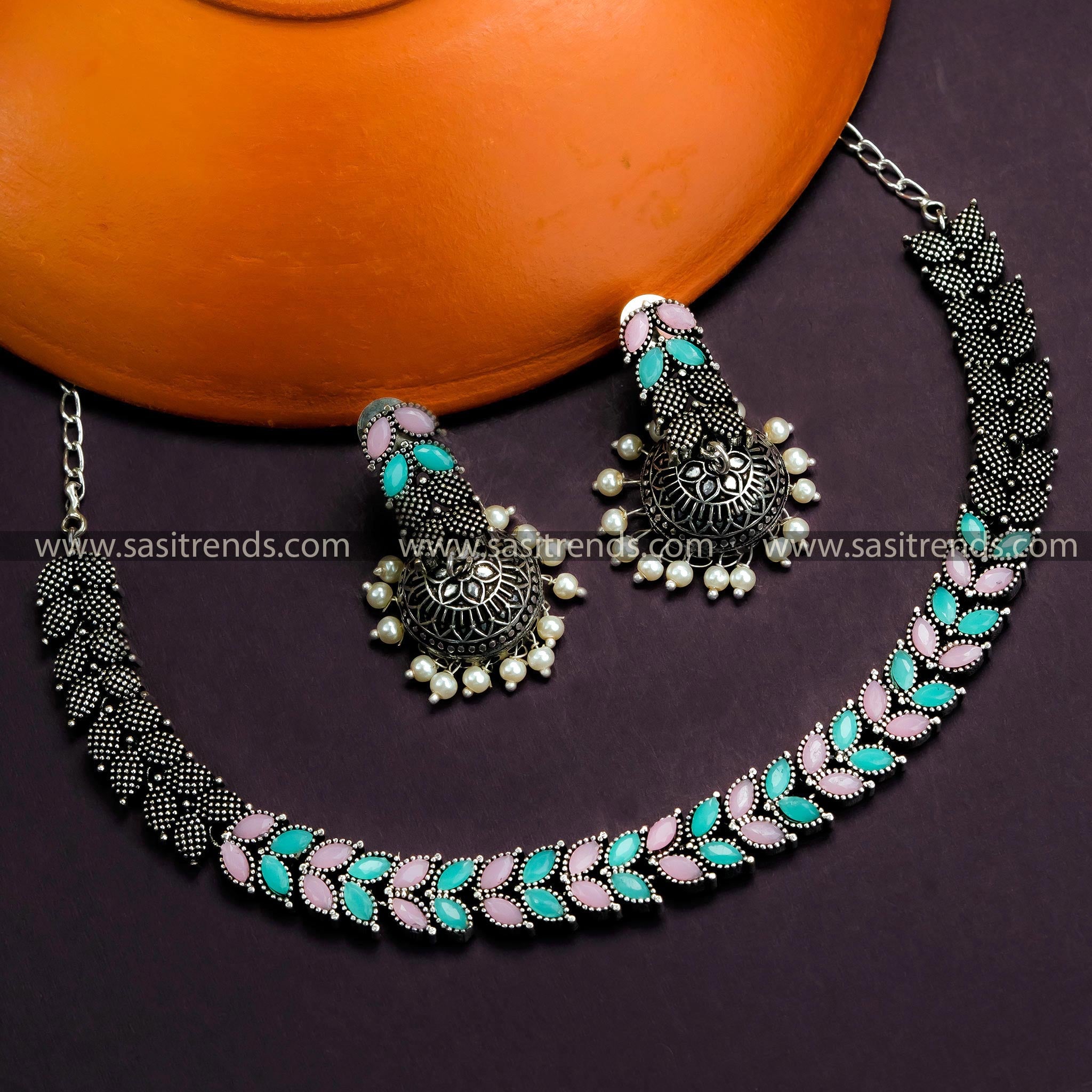 Trendy Party Wear Oxidized German Silver Leaf Necklace with Jhumkas & Mint-Pink Stones - Timeless Beauty for Online Shopping