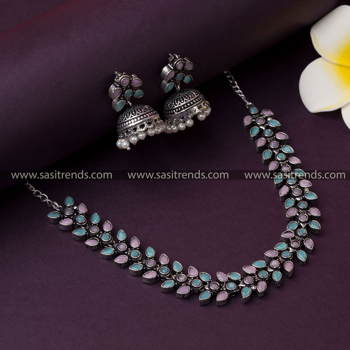 Trendy Party Wear Oxidised German Silver Necklace with Pink-Mint Stones and Pearl Jhumkas