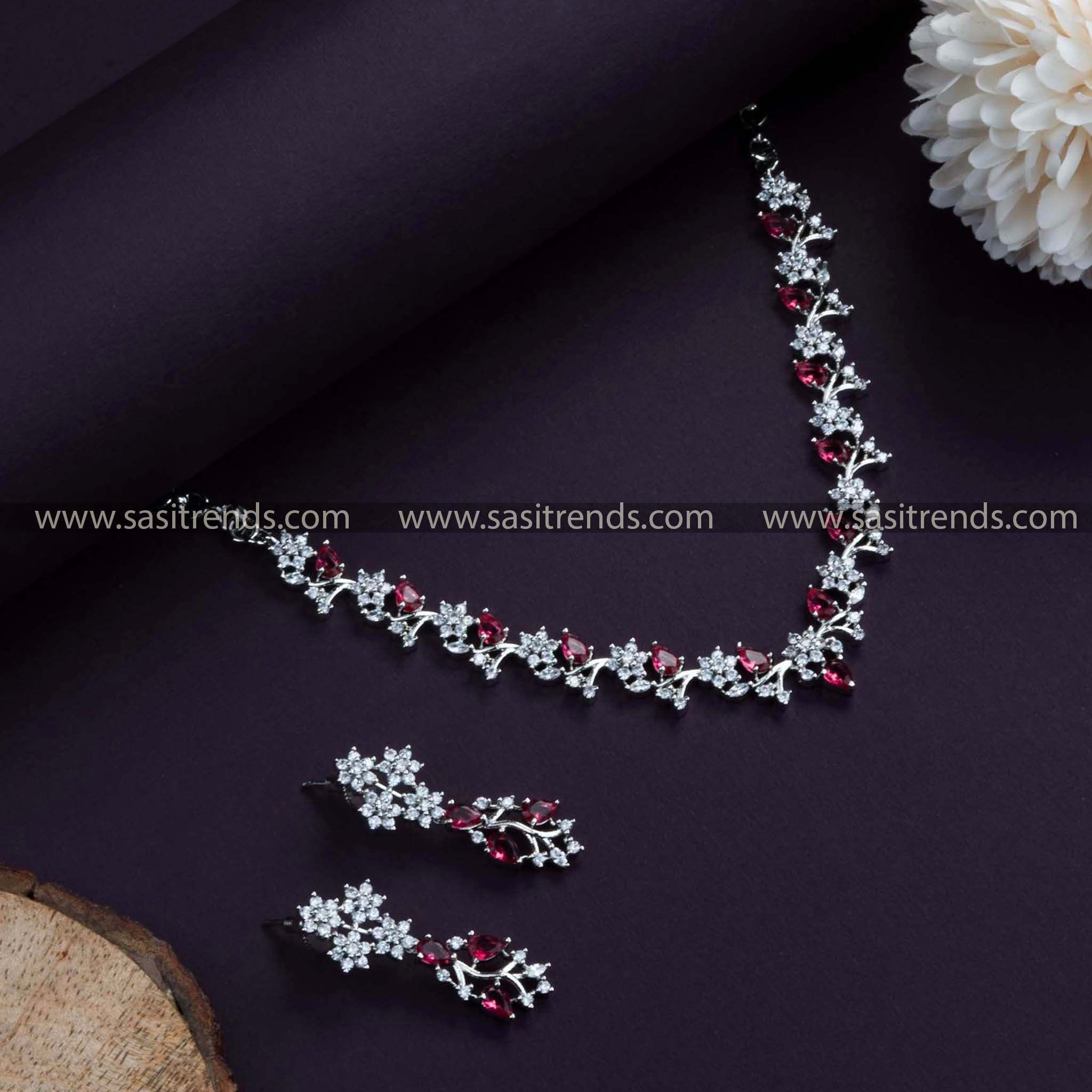 Glamorous Rhodium Silver Plated Necklace Set in Red. Stunning Floral Pattern, Embellished with American Diamonds