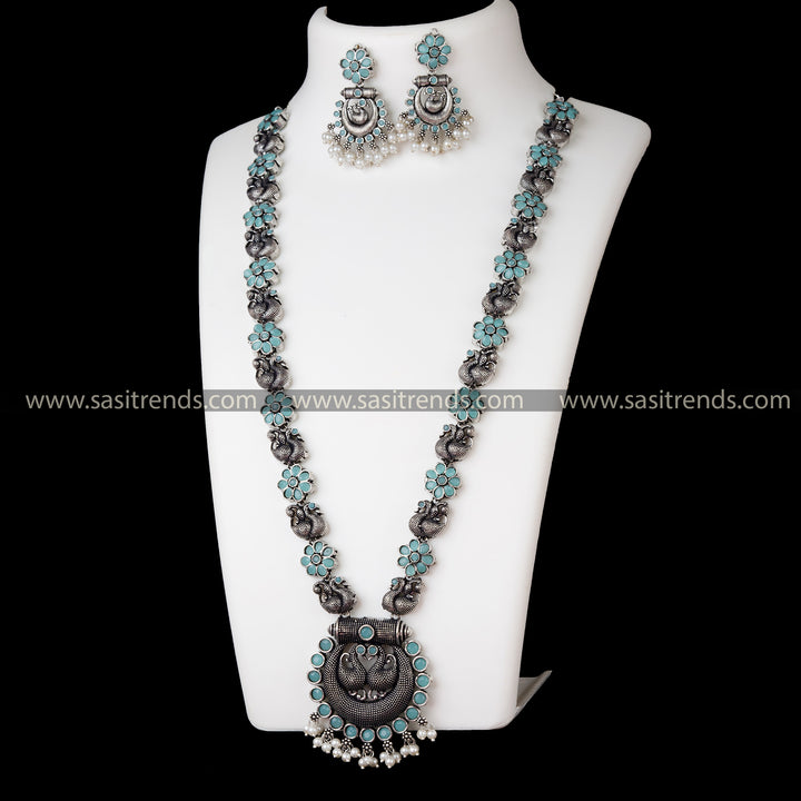 Stylish Oxidised German Silver Long Necklace Set with Peacock Chandbali Pendant and Mint Stones