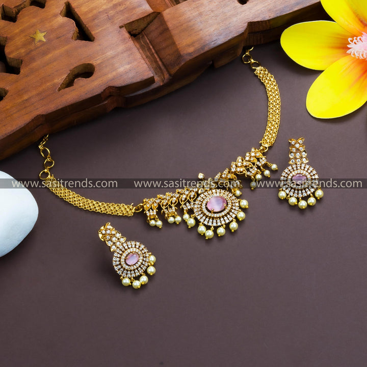 Gorgeous Temple Gold Plated AD Choker Necklace with Pink Stone Pendant and Leaf Pattern