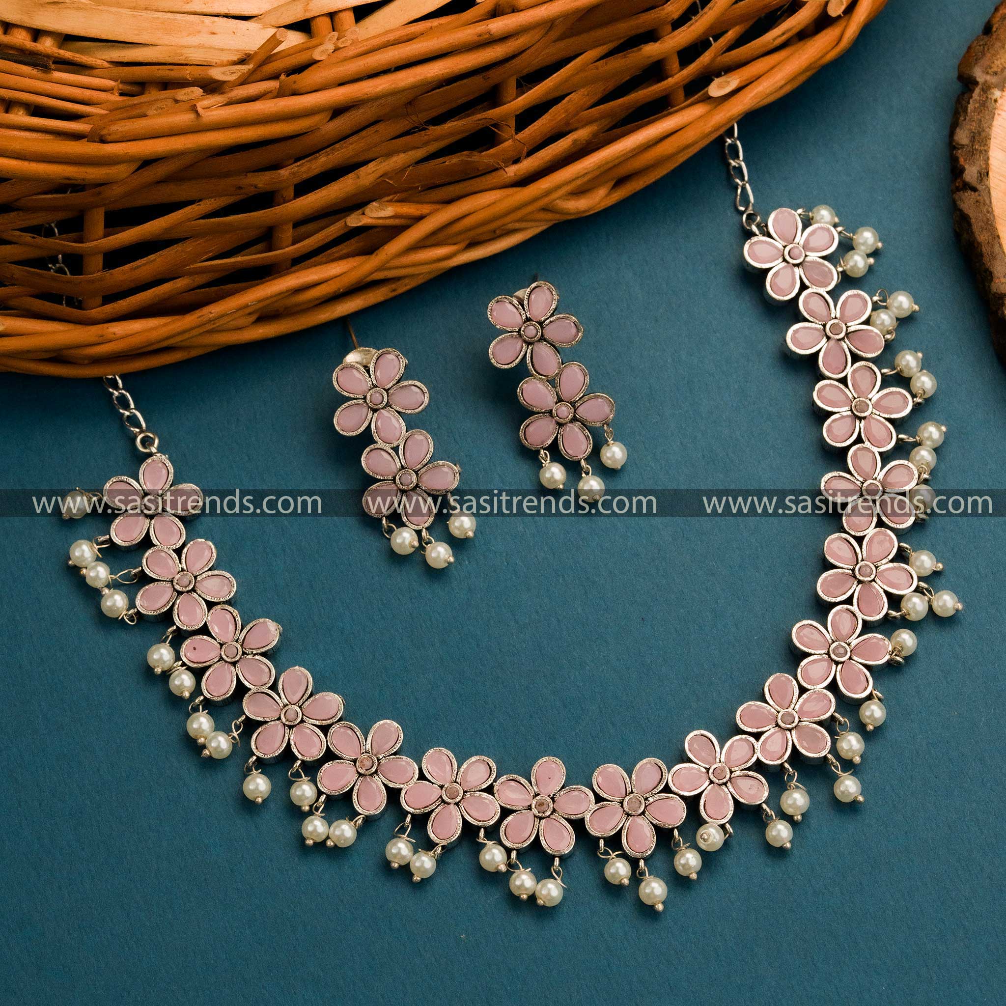 Buy Now: Trendy Oxidised German Silver Floral Necklace Set with Pink Stones - Ideal for Parties and Festivals