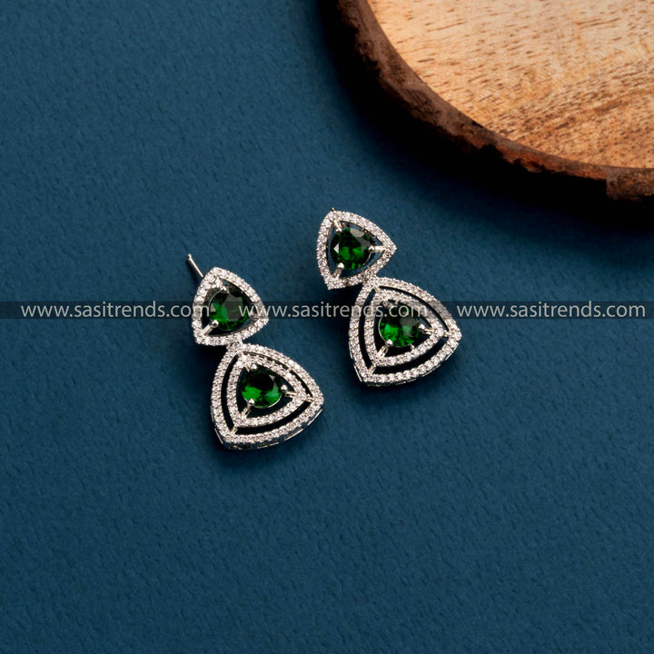 Trendy Rhodium Silver Earrings with Green Stones, Floral & Triangle Pattern, American Diamonds, Rich Party Wear Collection