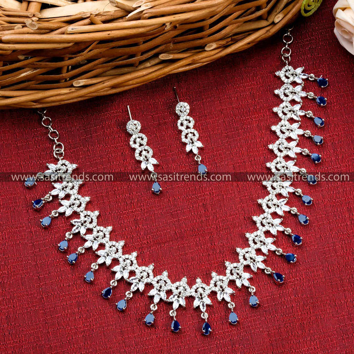 Stunning Blue Stone Necklace with Floral Pattern, Rhodium Silver Plating, and American Diamonds - Party Wear Jewelry Set