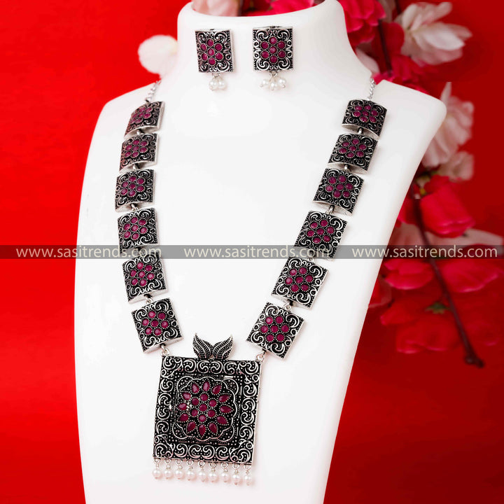 Stunning Trendy Party Wear Oxidised German Silver Pearl Necklace with Ruby-Green Stone Pendant and Pearl Earrings.