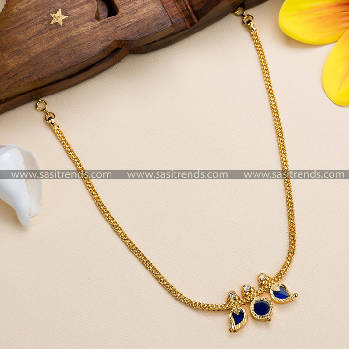 Sophisticated Micro Gold Plated Mango and Round Petals Kerala Necklace with American Diamond Stones in Elegant Blue Shades