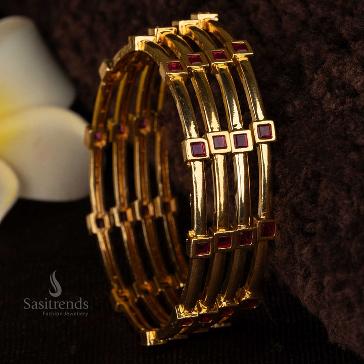 Ruby AD stone bangles with sleek gold plating - Sasitrends