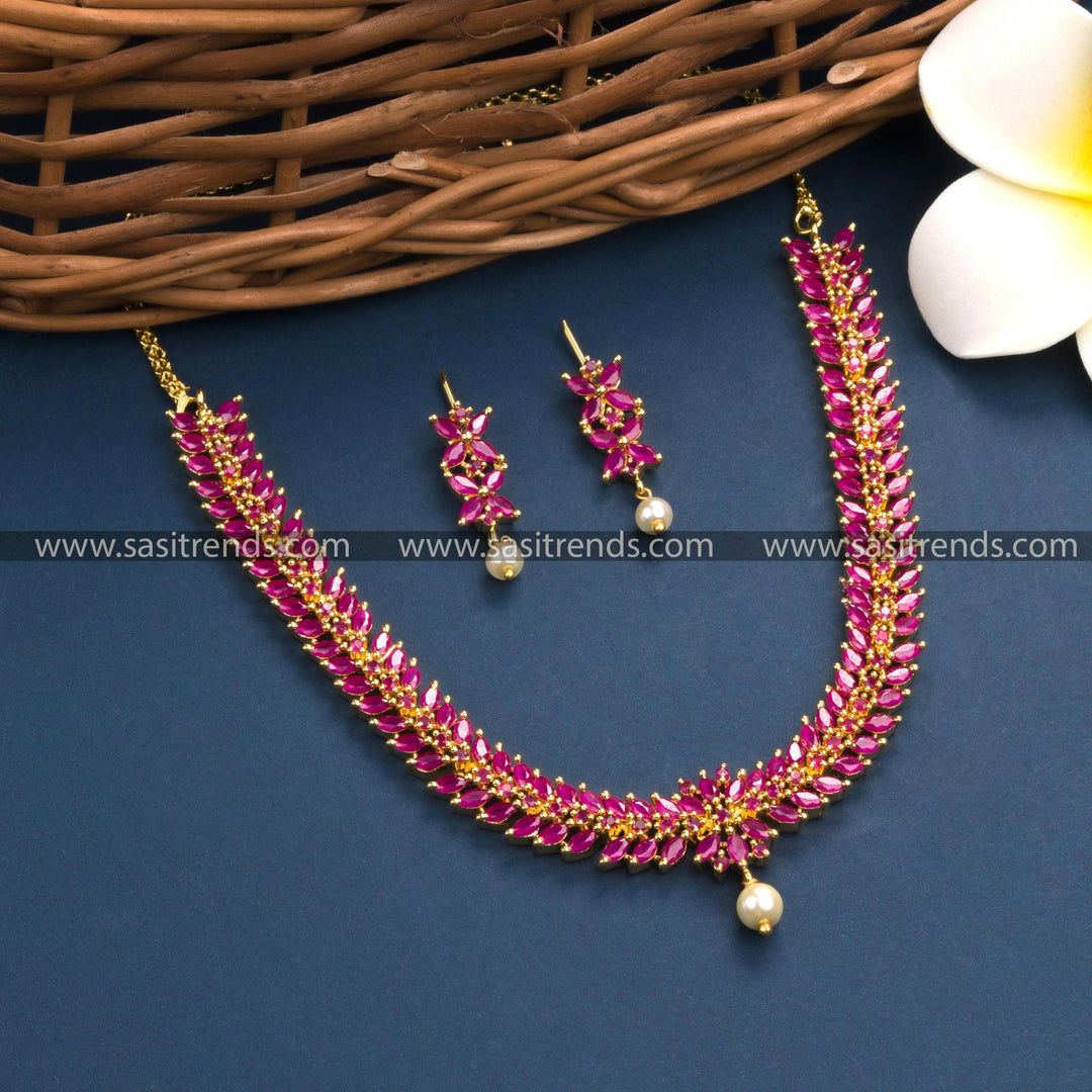 Trendy Traditional Micro Gold Plated Floral Leaf Necklace with Ruby AD Stones for Women - Elegant Party Wear Jewelry in Rich Ruby Hues