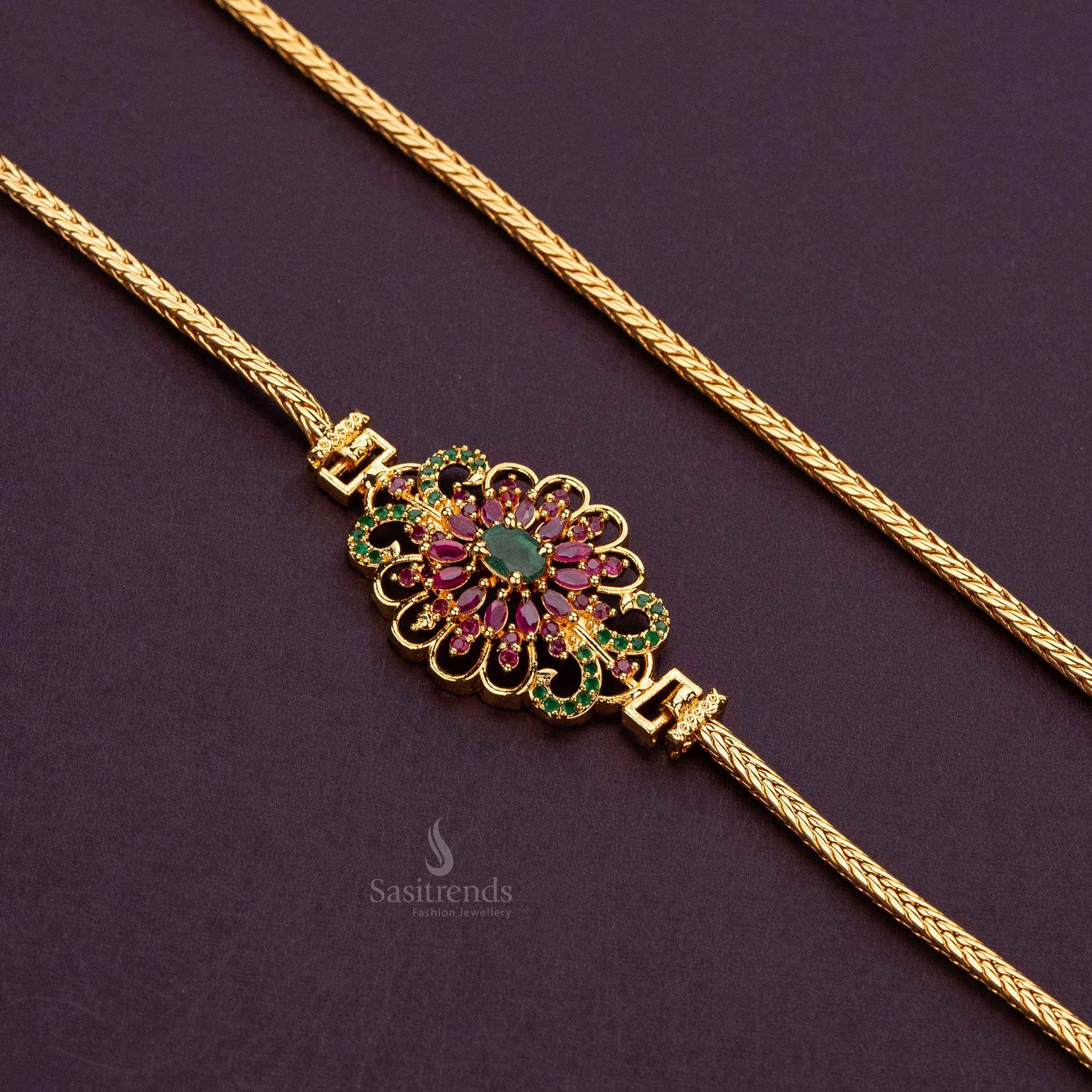 Intricate ruby-green AD stone-studded mugappu chain with micro gold plating and a detailed floral design - Sasitrends