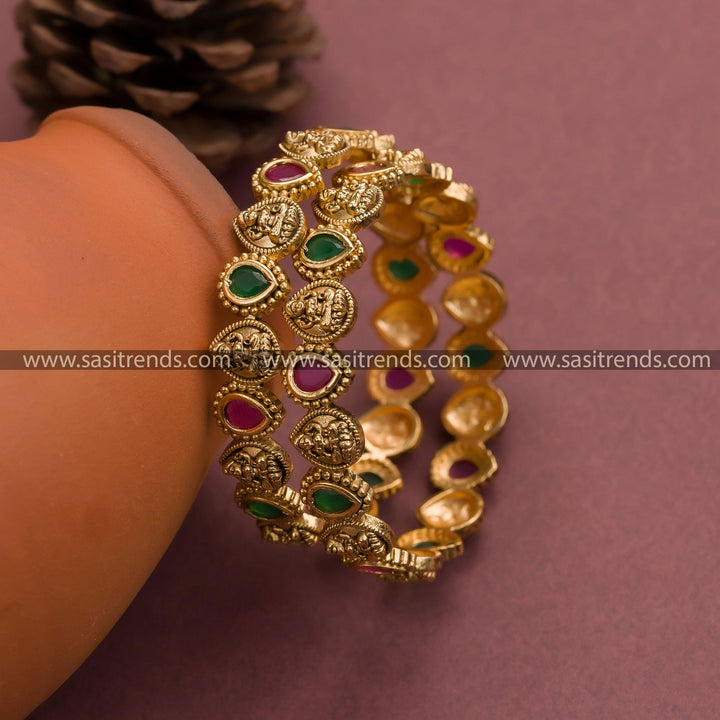 Gorgeous Ruby Green Matt Gold Plated Lakshmi Motif Bangles