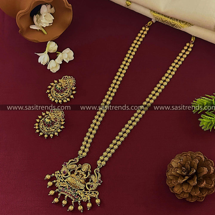 Bridal Lakshmi Pendant Long  Pendant Ruby-Green Necklace Set with Jhumkas - Exquisite Traditional Jewelry Set