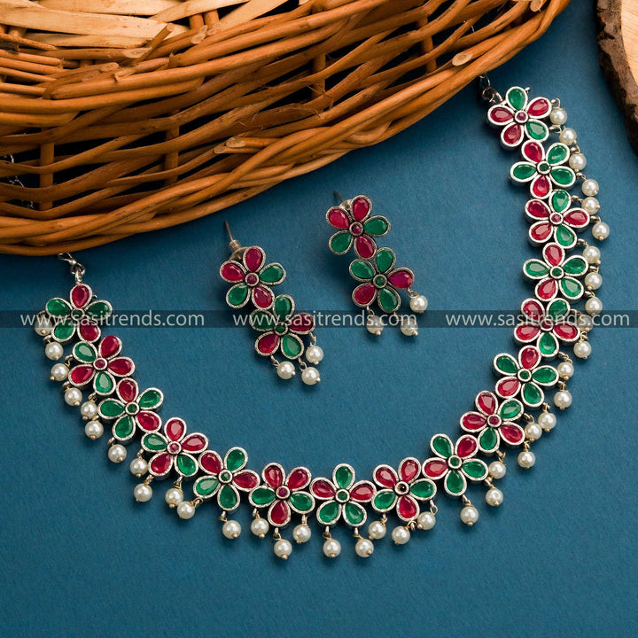 Trendy Oxidised German Silver Floral Necklace Set with Ruby and Green Stones - Fashionable Jewelry for Special Celebrations