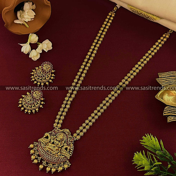 Bridal Lakshmi Peacock Pendant Ruby Necklace Set with Jhumkas - Traditional Matt Gold Finish Jewelry