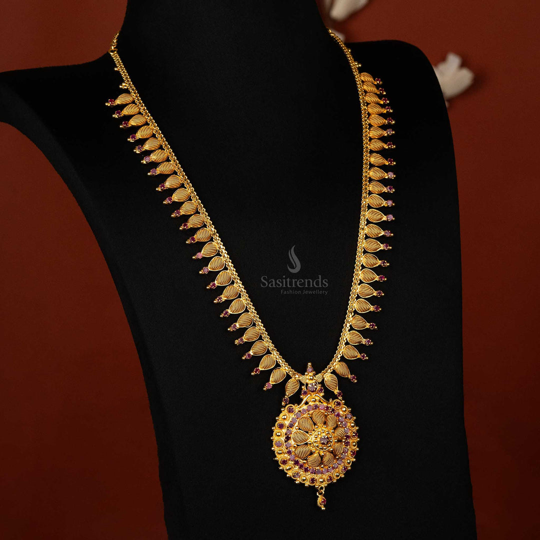 Leaf pattern ruby long haram necklace with floral pendant by -Sasitrends