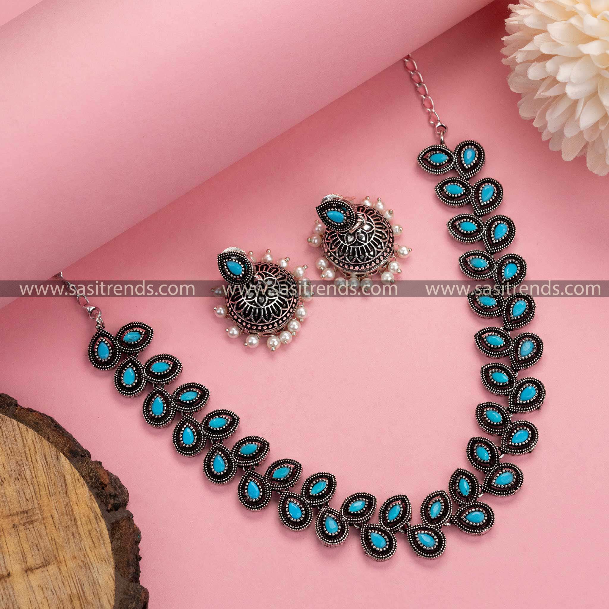 Sky Blue Splendor: Oxidised German Silver Necklace with Pearl Jhumkas - Elevate Your Fashion Quotient