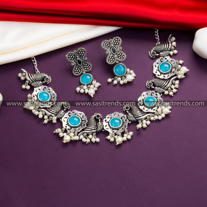 Elegant Sky Blue Stone Necklace Set: Floral and Peacock Motifs, Oxidised German Silver, Earrings