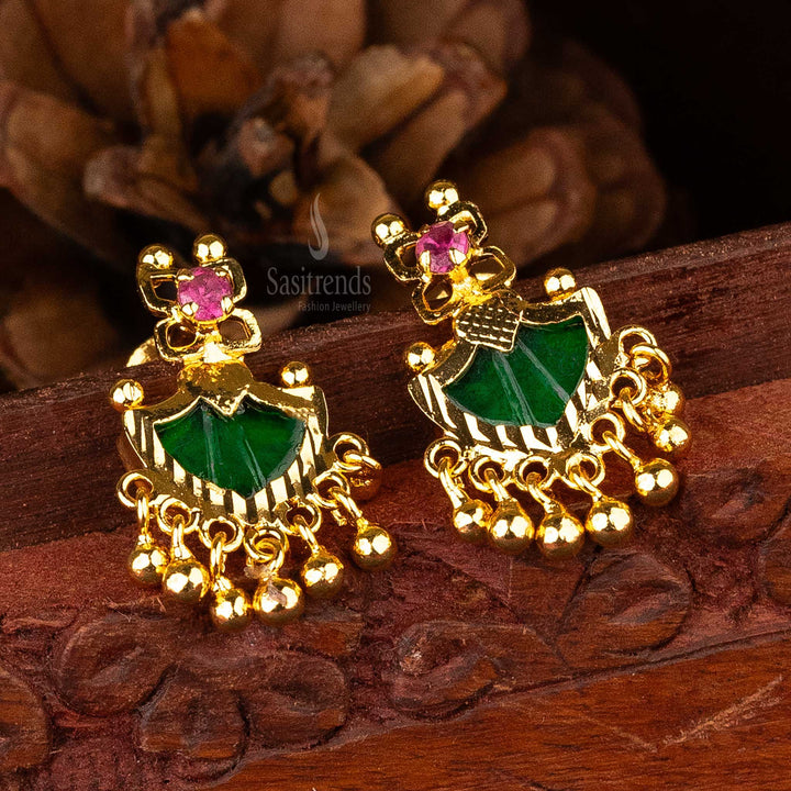 Stunning Palakka earrings with gold balls and green stones for a classic look