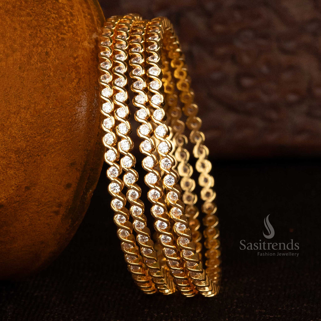 Elegant spiral AD stone bangles in micro gold plating for weddings - Sasitrends