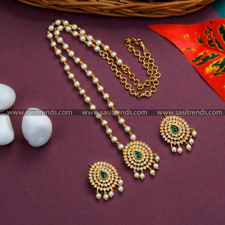 Latest Temple Matte Gold Toned Floral Pendant Pearl Jewellery Set with AD Stones and Hanging Pearl