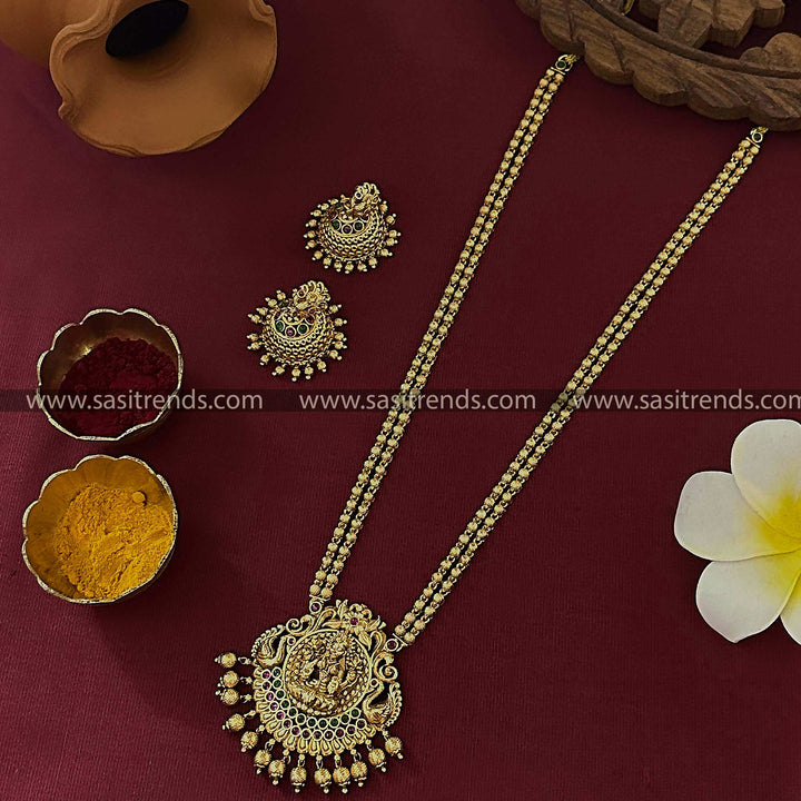 Gorgeous Temple Matte Gold Tone Long Haram Jewellery Set with Lakshmi Pendant - Sasitrends