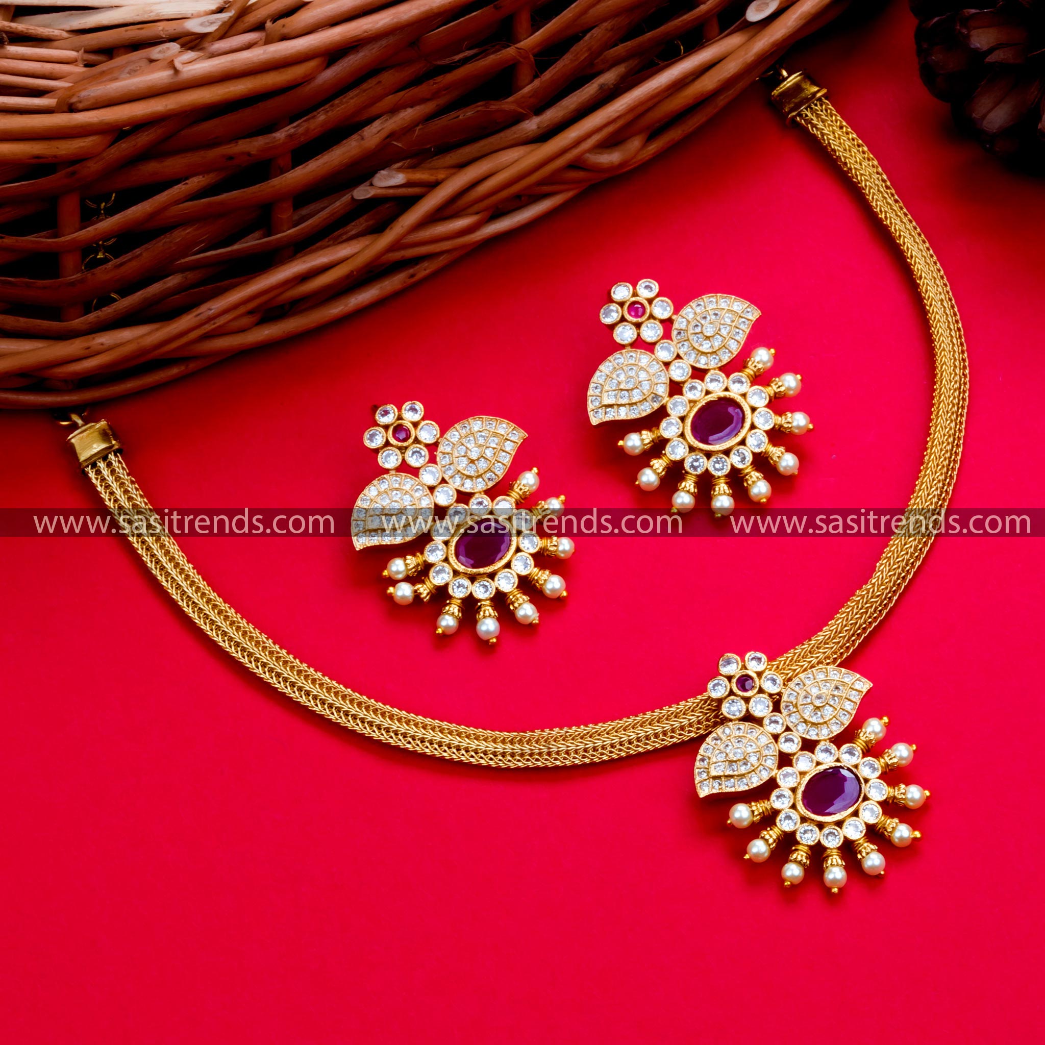 Temple gold plated floral choker necklace set with White-Ruby AD stones