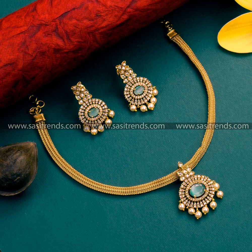 Mint Stone Floral Pendant Choker: Matte Gold Plated Attigai Necklace with Pearl Drops - Refreshing Traditional Radiance