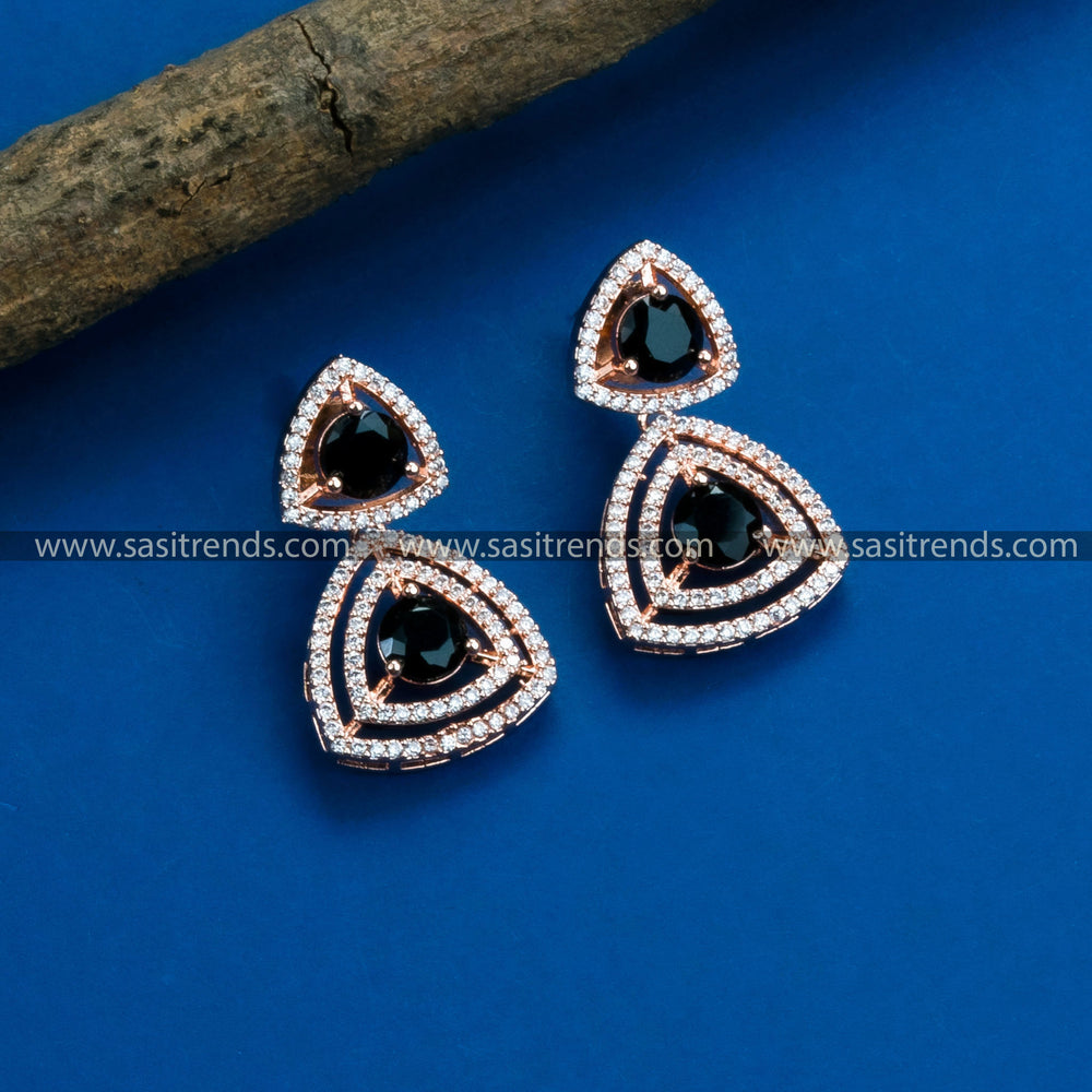 Elegant rose gold plated earrings with stunning floral pattern, adorned with American Diamonds and black stones. Perfect for parties and events.