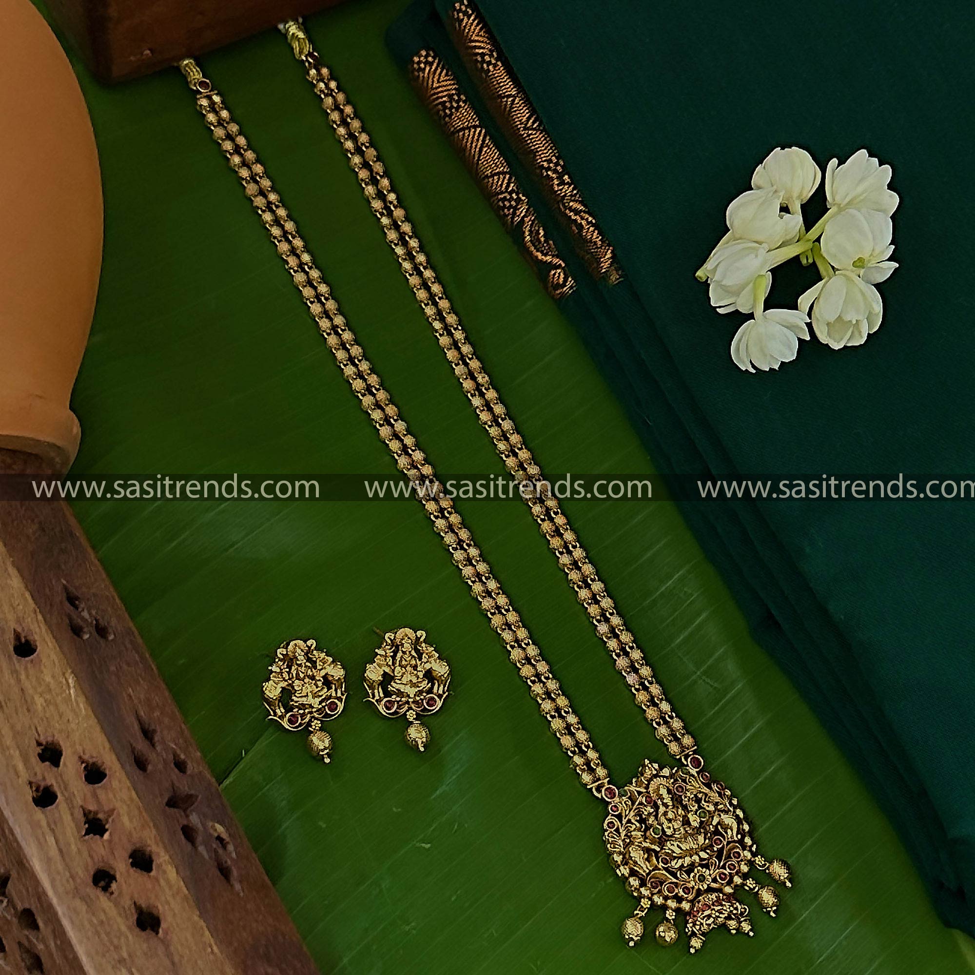 Exquisite Temple Gold Plated Necklace with Ruby-Green Stones - Lakshmi Motif, Elegant Elephants, Ideal for Weddings 