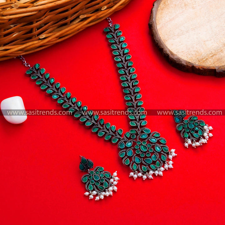 Stunning Navrathri Special Oxidized German Silver Floral Pendant Necklace with Green Stones