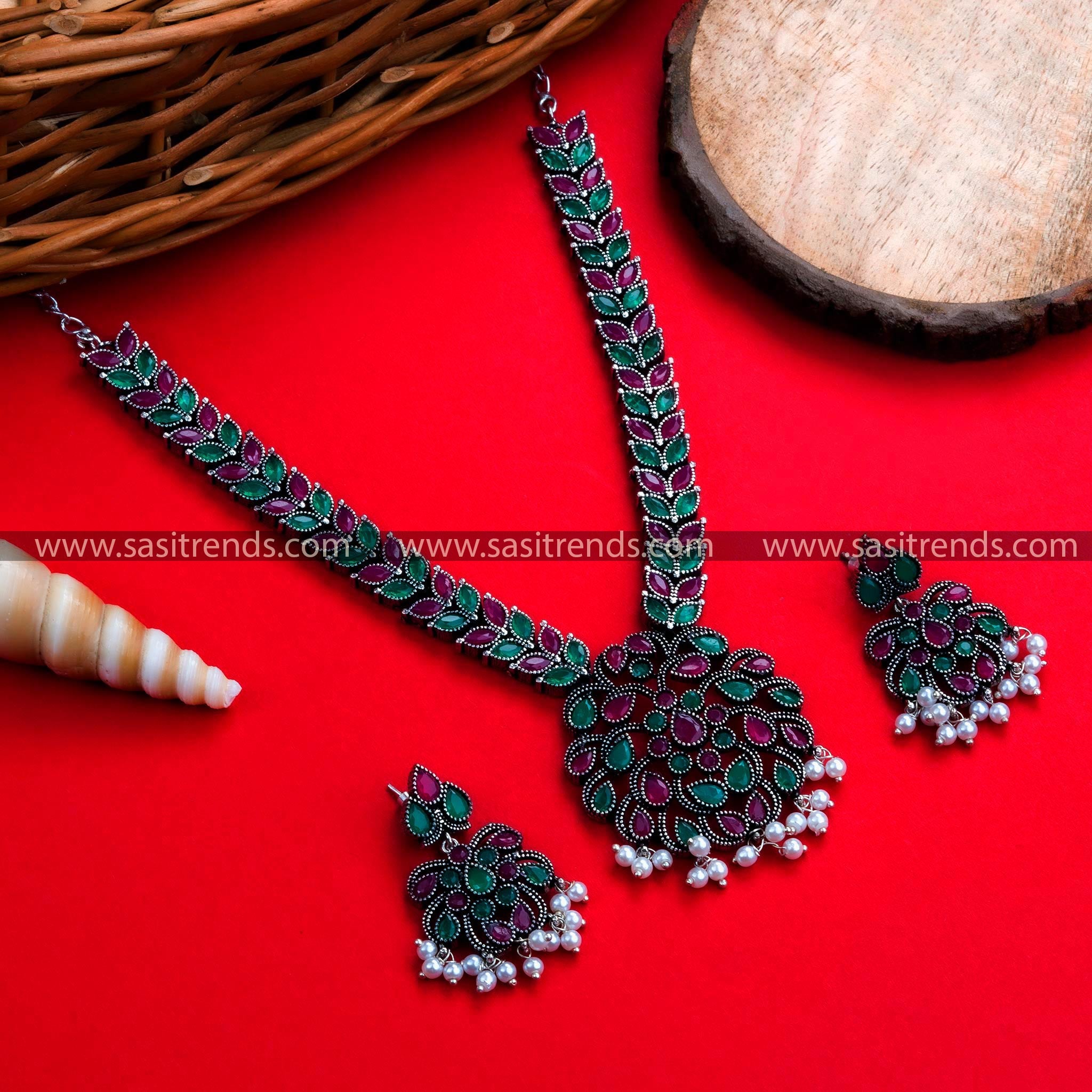 Captivating Navrathri Special Oxidized German Silver Floral Pendant Necklace with Ruby-Green Stones – Festive Jewelry