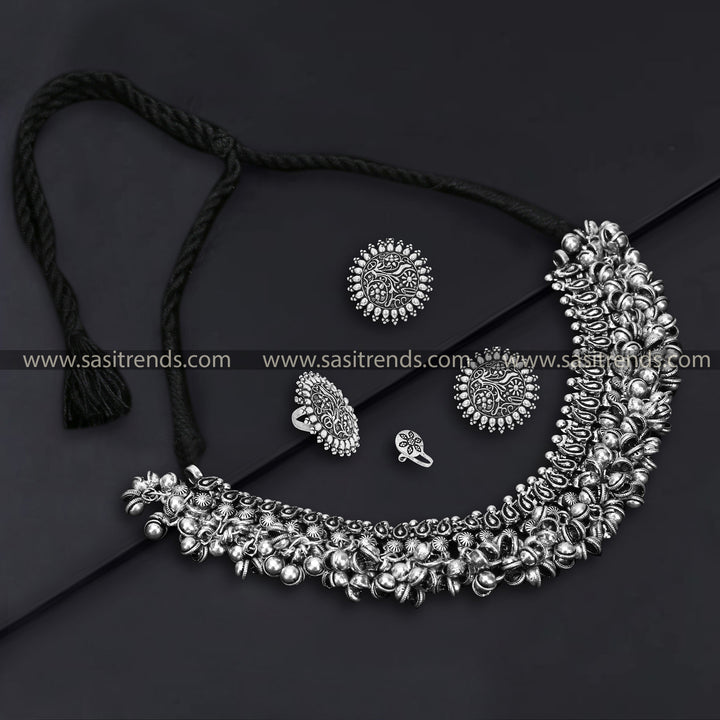 Elegant Oxidised German Silver Navarathna Combo Jewelry Set with Mango Leaf Pattern, Stud Earrings, Nose Pin, and Ring