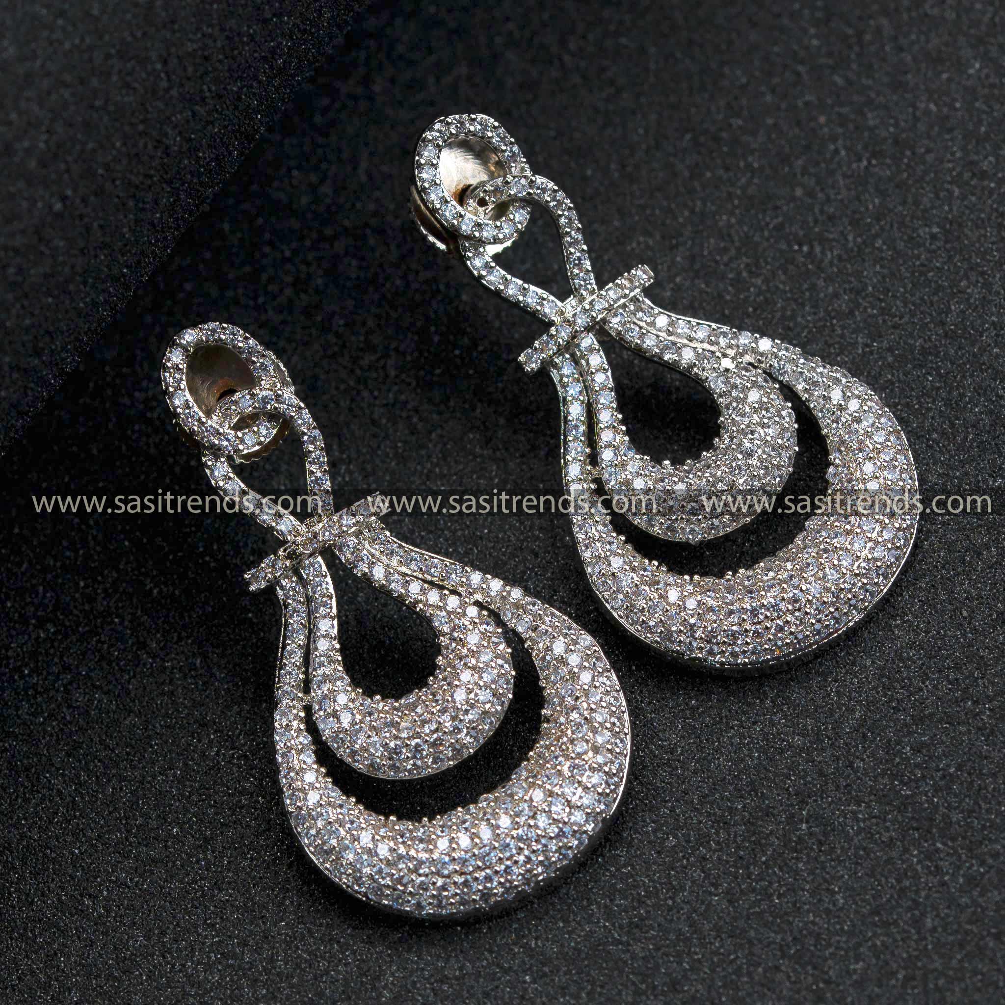 Trendy Party Wear Rhodium Silver Plated American Diamond Earrings - Two-Layered Tear Drop Pattern for Women