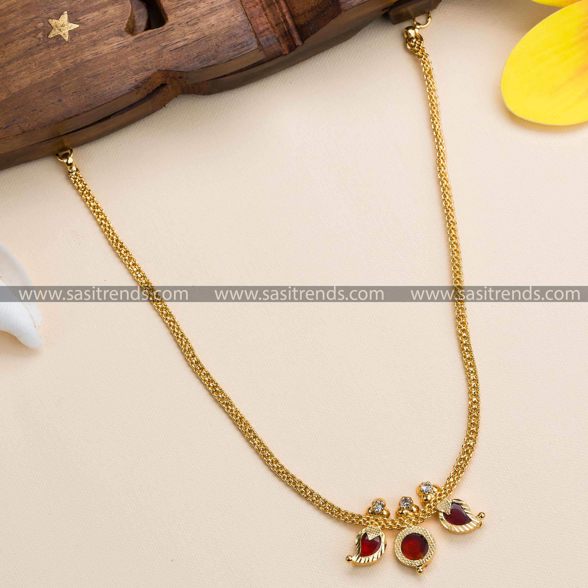 Exquisite Micro Gold Plated Mango and Round Petals Kerala Necklace with American Diamond Stones in Rich Red Hues