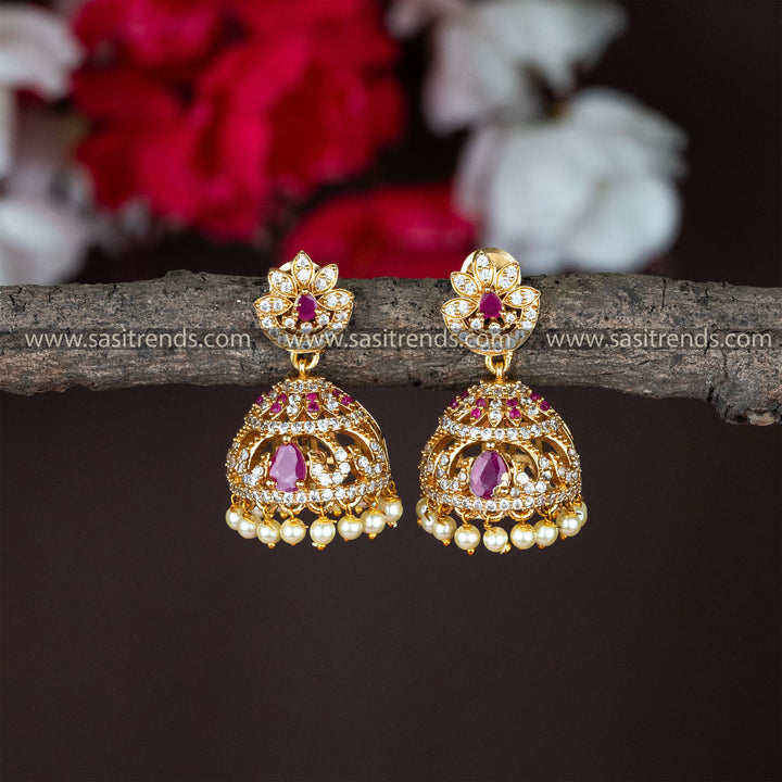 Trendy White Ruby Matt Gold Plated Push Back Jhumka Earrings