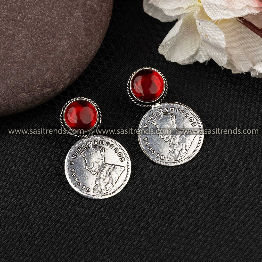 Ruby red Monalisa stone in oxidized George V Emperor coin earrings