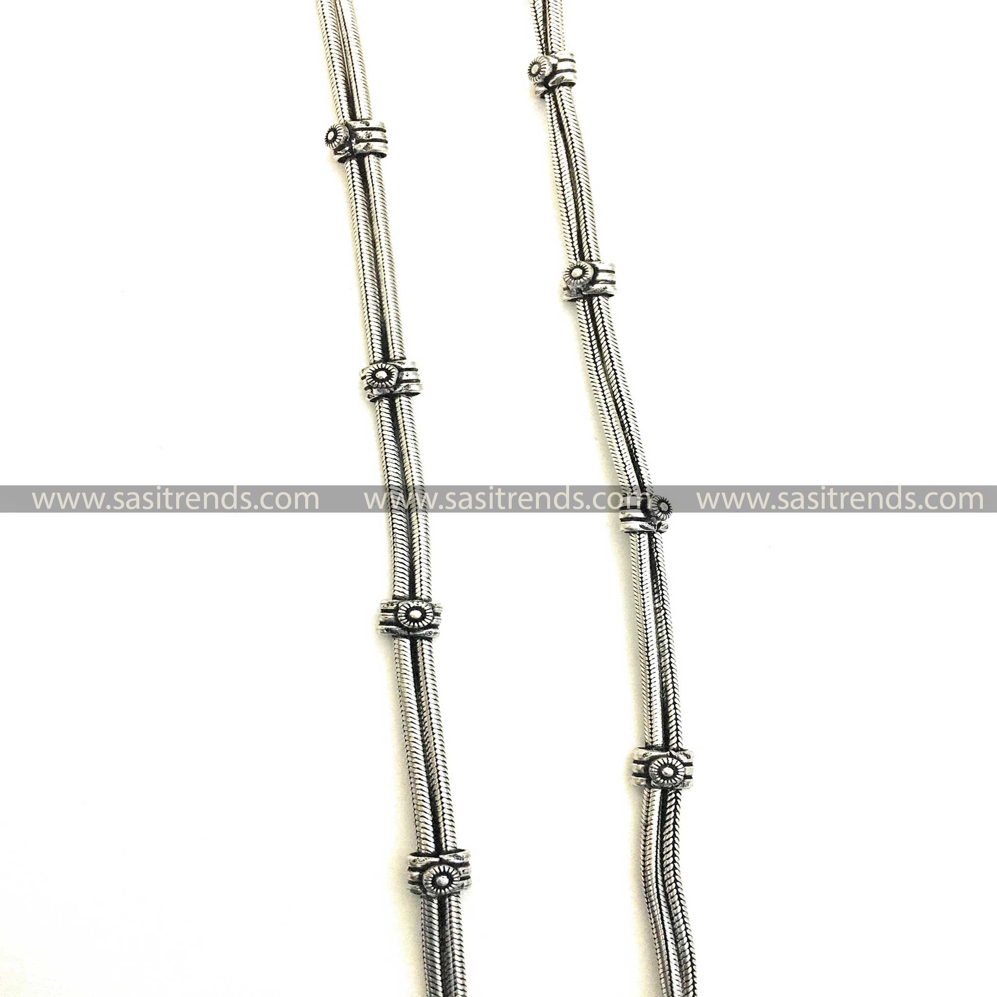 Artisanal silver anklets featuring a secure decorative clasp 