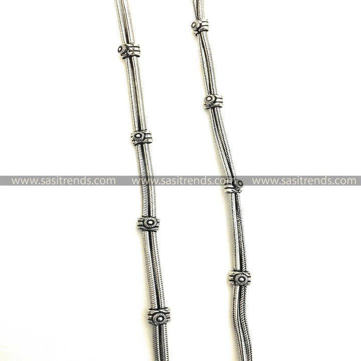 Artisanal silver anklets featuring a secure decorative clasp 