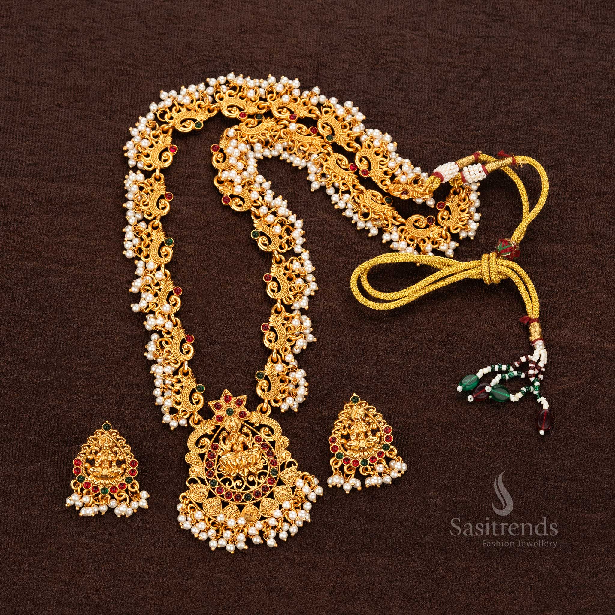 Ruby-green temple jewellery set with pearl embellishments - Sasitrends