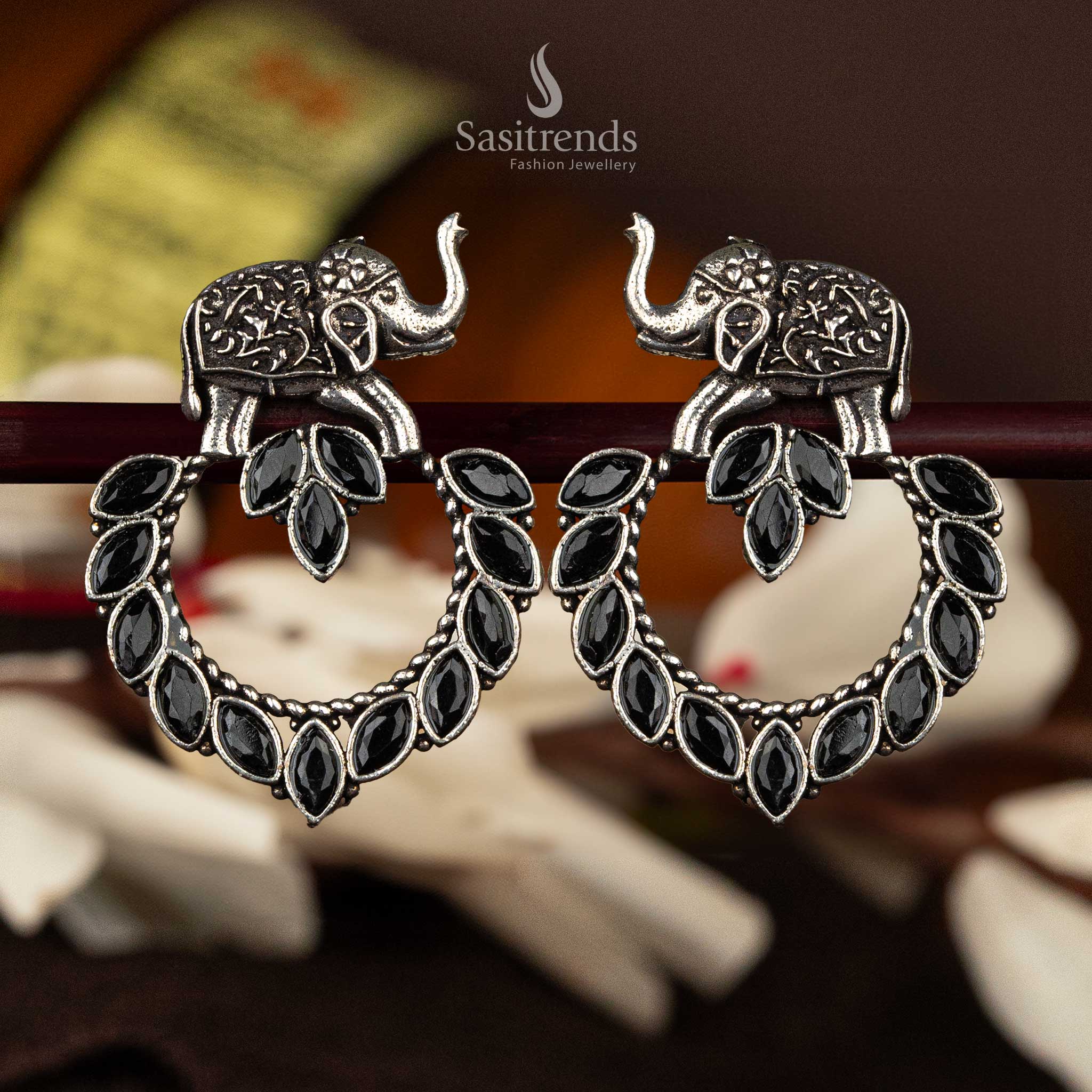 Black marquise stone oxidised silver earrings with detailed elephant motif - Sasitrends