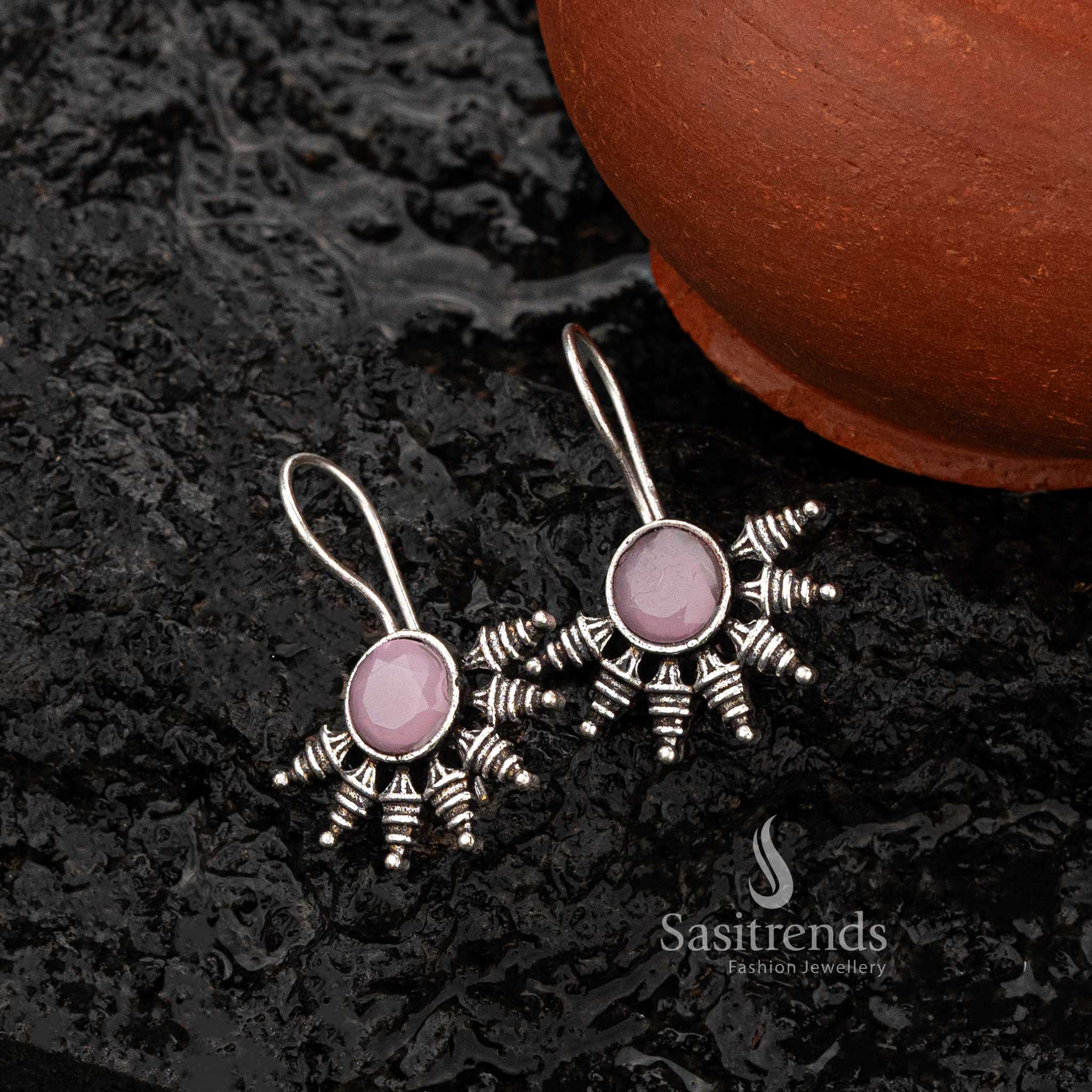 Pink round stone oxidised earrings with intricate craftsmanship - Sasitrends





